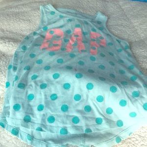 A light blue GAP tank top